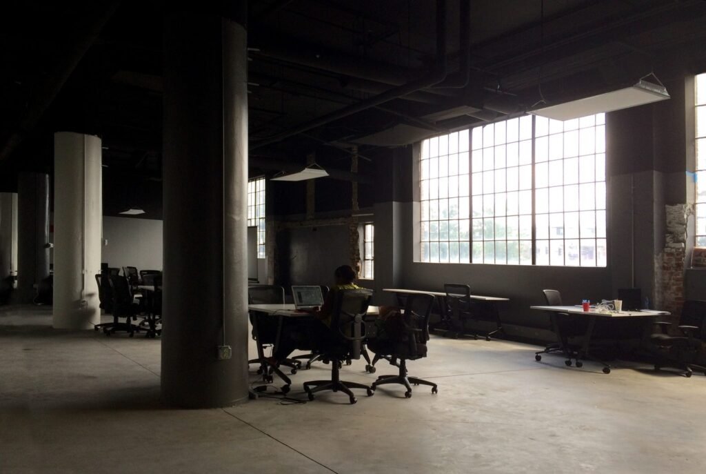Office Boy Jobs in Portugal 2026 | Salary, Requirements & Apply Now Office worker at a desk in a modern office